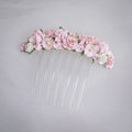 Ballet French twist clear hair comb with a pink and white floral design on a white background