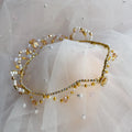 Delicate beaded tiara on a soft fabric background